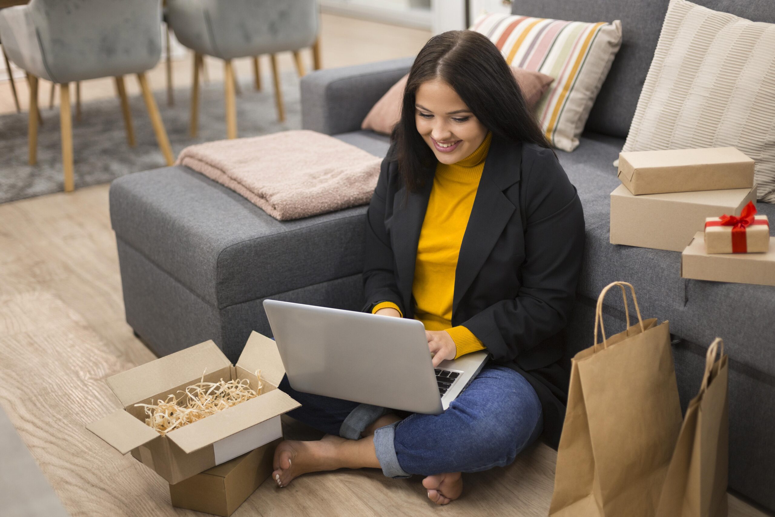 woman-sitting-floor-with-her-laptop-her-lap
